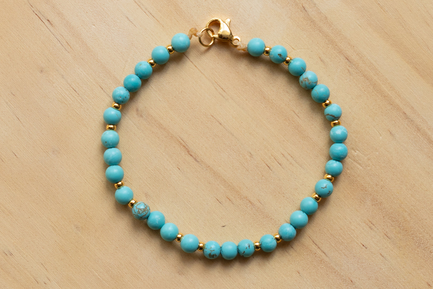 Turquoise bracelet gold plated