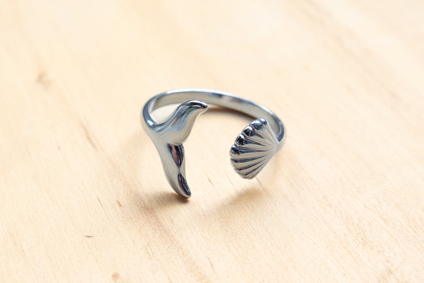 Whale tail and shell ring  silver colour